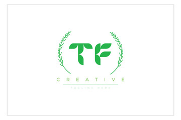 TF letters eco logo with leaf. Fresh nature and healthy leaf logo design.