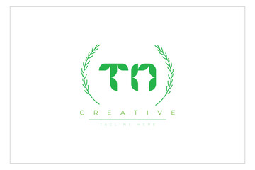 TN letters eco logo with leaf. Fresh nature and healthy leaf logo design.
