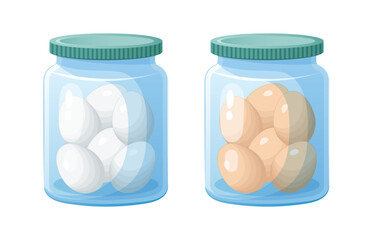 Glass jars with white and brown eggs.	