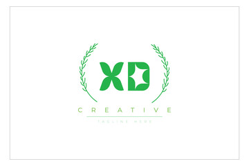 XD letters eco logo with leaf. Fresh nature and healthy leaf logo design.
