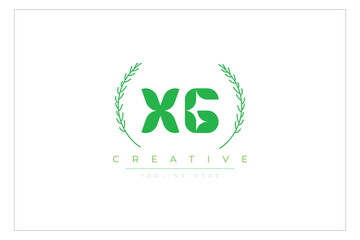 Fototapeta premium XG letters eco logo with leaf. Fresh nature and healthy leaf logo design.