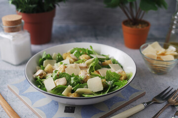 A bowl with classic Caesar salad