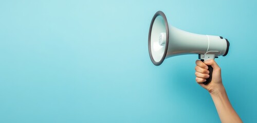 Hand holding megaphone, blue background, announcement (5)