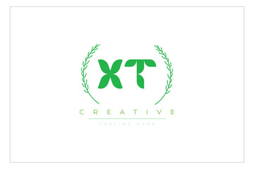 XT letters eco logo with leaf. Fresh nature and healthy leaf logo design.