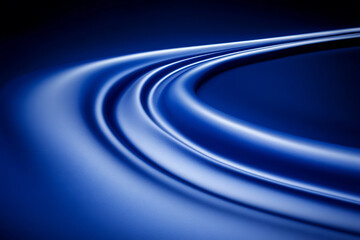 Abstract blue curves create dynamic flow