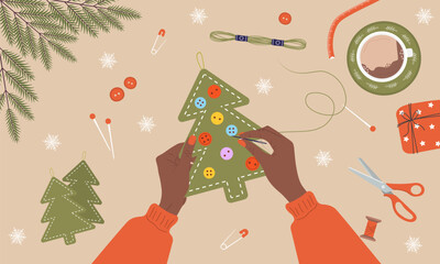 Felt Christmas Tree. African Girl create Christmas tree from fabric and threads. Top view on workplace. DIY holiday decorations. Christmas eve preparation. Vector illustration in flat cartoon style.