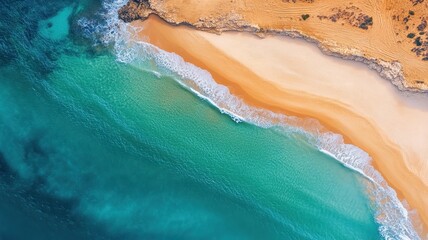 Fototapeta premium Vibrant blue water surface at sandy beach aerial view nature photography tropical paradise