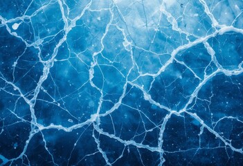 A close-up photo of cracked, blue ice