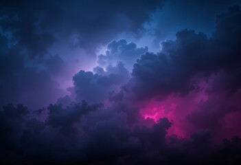 Obraz premium A dark, stormy sky with shades of black, purple, blue, and pink