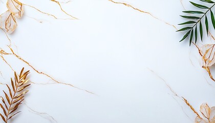 A decorative arrangement featuring dried leaves and green foliage on a white marble background. Ideal for nature-themed designs, invitations, or eco-friendly projects.