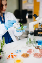 Food science as lab scientists test and analyze vegetables for safety and quality using advanced technology