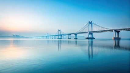 Serene Dawn A Modern Suspension Bridge Spans Tranquil Waters, Reflecting the Calm of the Early Morning Light