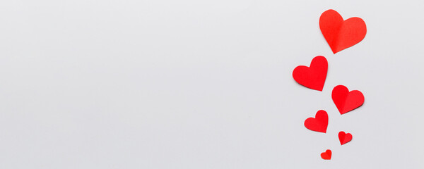 Valentine day background with red hearts, top view with copy space