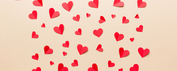 Valentine day background with red hearts, top view with copy space