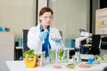 Scientist in a modern lab analyzing food samples with advanced equipment. Perfect for food science, research