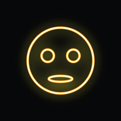 Bright yellow neon sign in the shape of a sad face is glowing on a black background