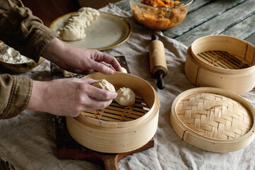 Making Asian steamed dumplings