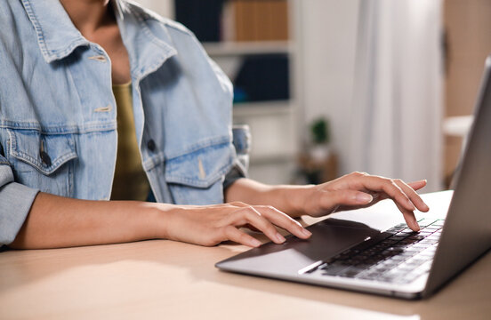 Women, keyboard and hand typing on laptop, surfing the web and searching for online reviews, email, admin and schedule planning.