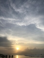 sunrise or sunset on the beach or sea
