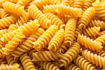 Close-up of Raw Fusilli Pasta: A Pile of Uncooked Italian Pasta