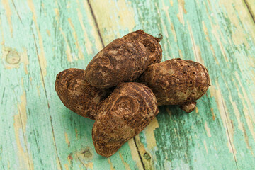 Brown topinambur roots for cooking