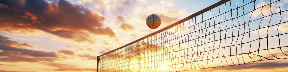 volleyball soars over net during vibrant sunset, capturing dynamic and energetic moment.