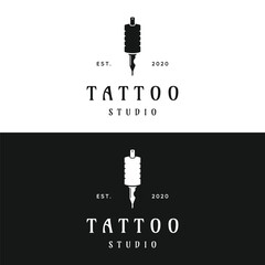 Vintage retro tattoo machine template logo design isolated background.Logo for studio, emblem and business.
