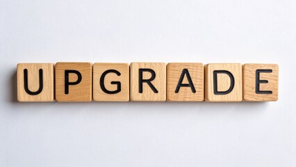 Wooden Alphabet Blocks Forming the Word Upgrade in a Business Concept of Growth and Development