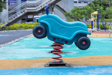 Colorful Playground with Slides and Swings in Park