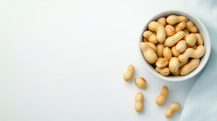 Discover the benefits of nutritious peanuts. Explore delicious snack options with healthy roasted peanuts in a white bowl.