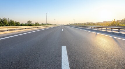 Fototapeta premium A sunlit highway overpass stretches into the distance, capturing the essence of open roads, freedom, and the promise of new journeys.