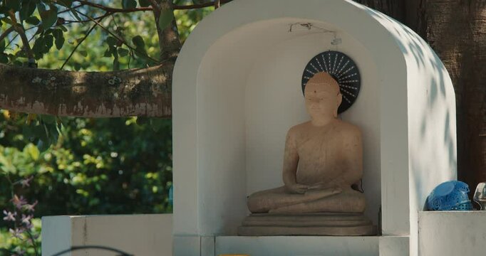 Japanese Peace Temple In Rumassala, Galle, Sri Lanka. Close up Statue of Lord Buddha in Parinirvana, Japanese Peace Pagoda