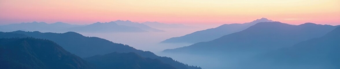 Obraz premium Softly glowing clouds float above misty mountains, misty mountains, landscape