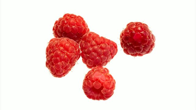 red raspberries on a white isolated background