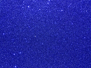Royal blue sparkle background. Blue glitter background. Blue glimmer. Abstract twinkle texture....