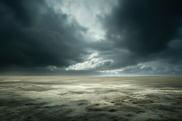 Obraz premium Dramatic Landscape with Dark Clouds Over an Empty Terrain