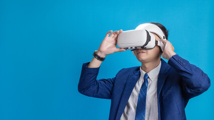 Businessman in VR headset controls virtual reality AI program to give instructions