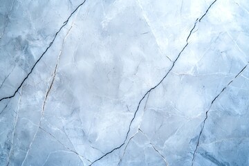 A close-up image of a light blue marble surface featuring unique textures and patterns, ideal for backgrounds, design projects, and artistic presentations.