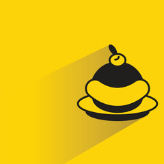 pudding cake icon with shadow on yellow background