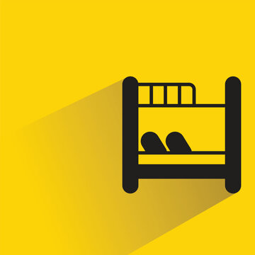 bunk bed icon with shadow on yellow background