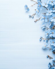 Aesthetic blue flowers arranged artfully against a light blue background, perfect for floral designs, backgrounds, or nature-themed projects.