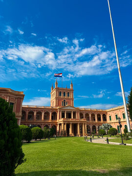 Palace in Paraguay with flag flying and blue sky