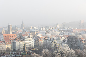 View from Petersberg of Erfurt Cathedral with a snow-covered landscape.