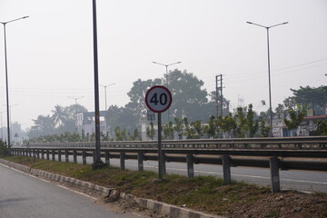 The speed limit sign board warns drivers to keep speed limit till 40 km per hour