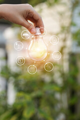 light bulb against nature, icons