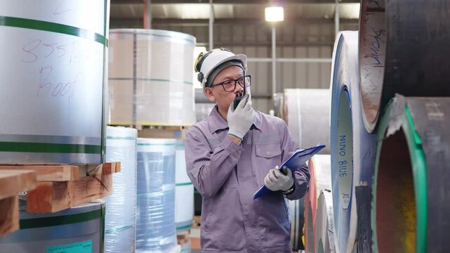The factory engineer controls the machinery used to produce zinc sheets and uses radio for communication.