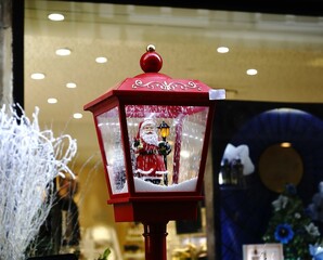 Christmas lantern decoration. Festive light. Red ornament. Holiday decor.

