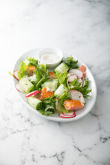 Leaf salad with salmon