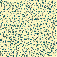 Delicate shamrocks seamless pattern featuring small green leaves and flowers on soft yellow background