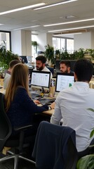 A team of marketers working on a digital marketing strategy in a collaborative, open-plan office environment